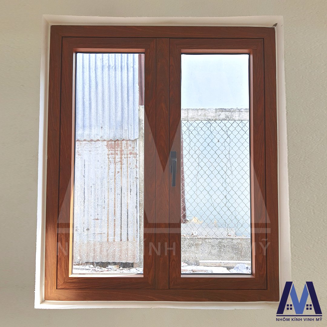 Gợi ý mẫu cửa sổ nhôm kính giả gỗ đẹp cho mọi công trình | z2408264805274 ab5ea0fae1baa051d3fd502cd569a441